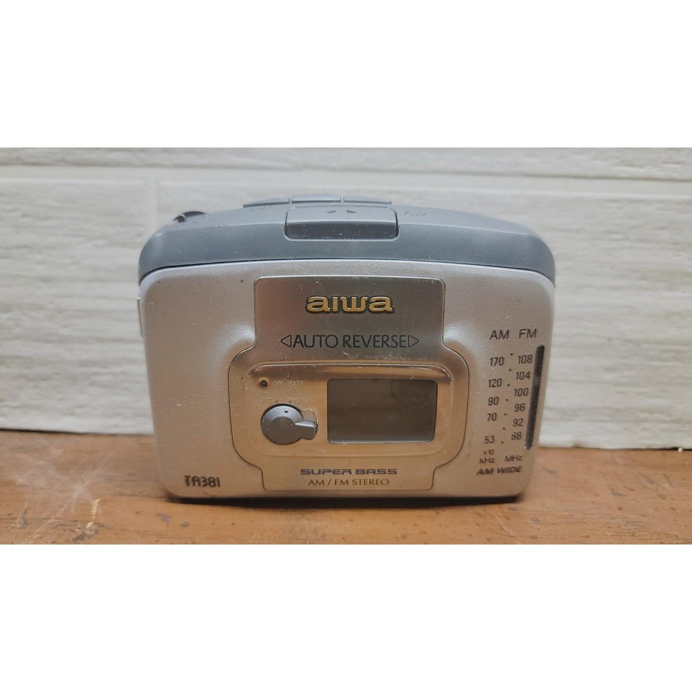 Aiwa TP381 portable cassette player with AM/FM radio and auto-reverse.